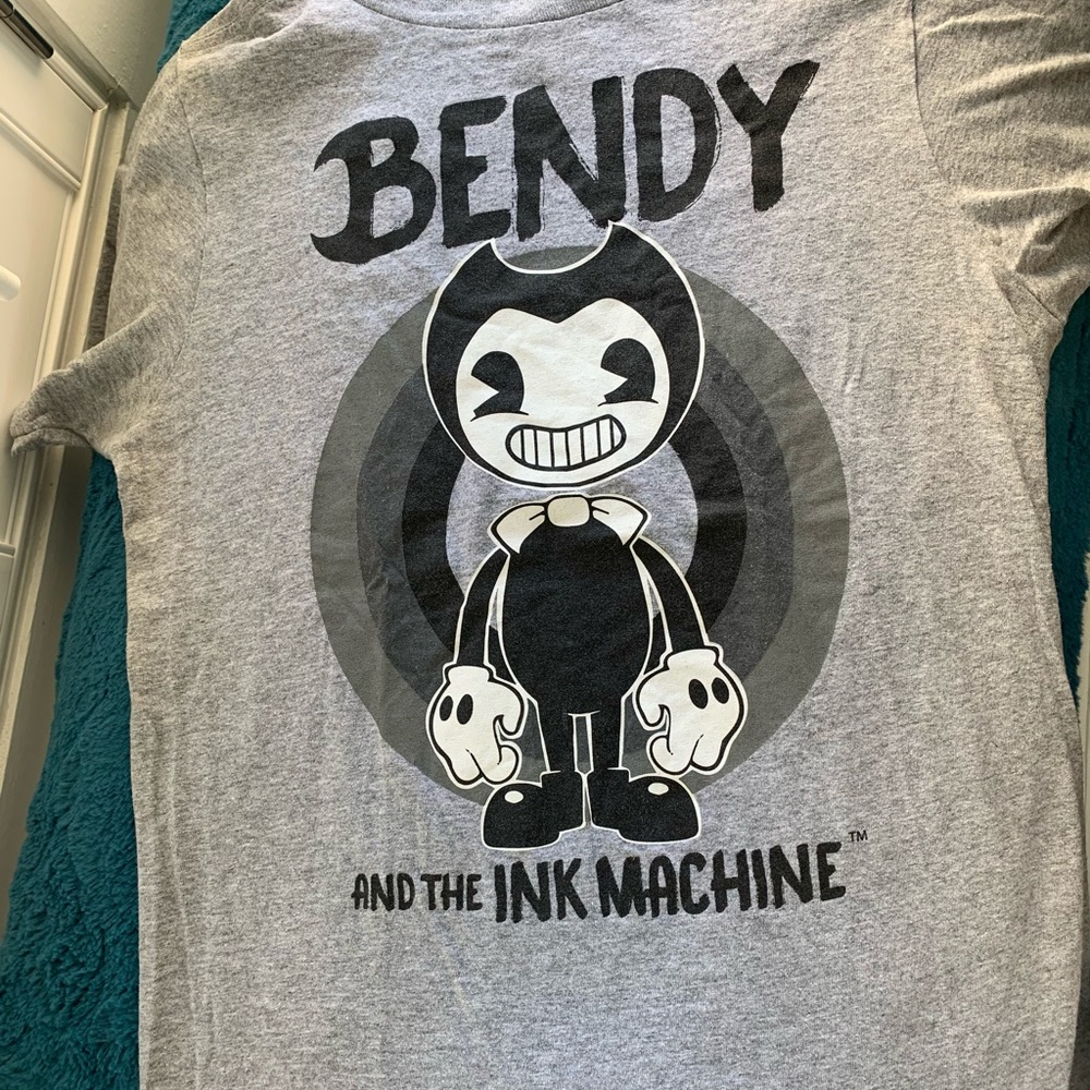 Bendy Tee    Stands solo w/ bow tie smile